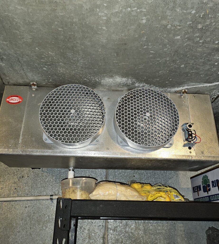 20250609_170036 Professional Everett appliance technician fixing a walk in cooler