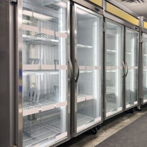 the front view of a walk in cooler. bright neon white colors