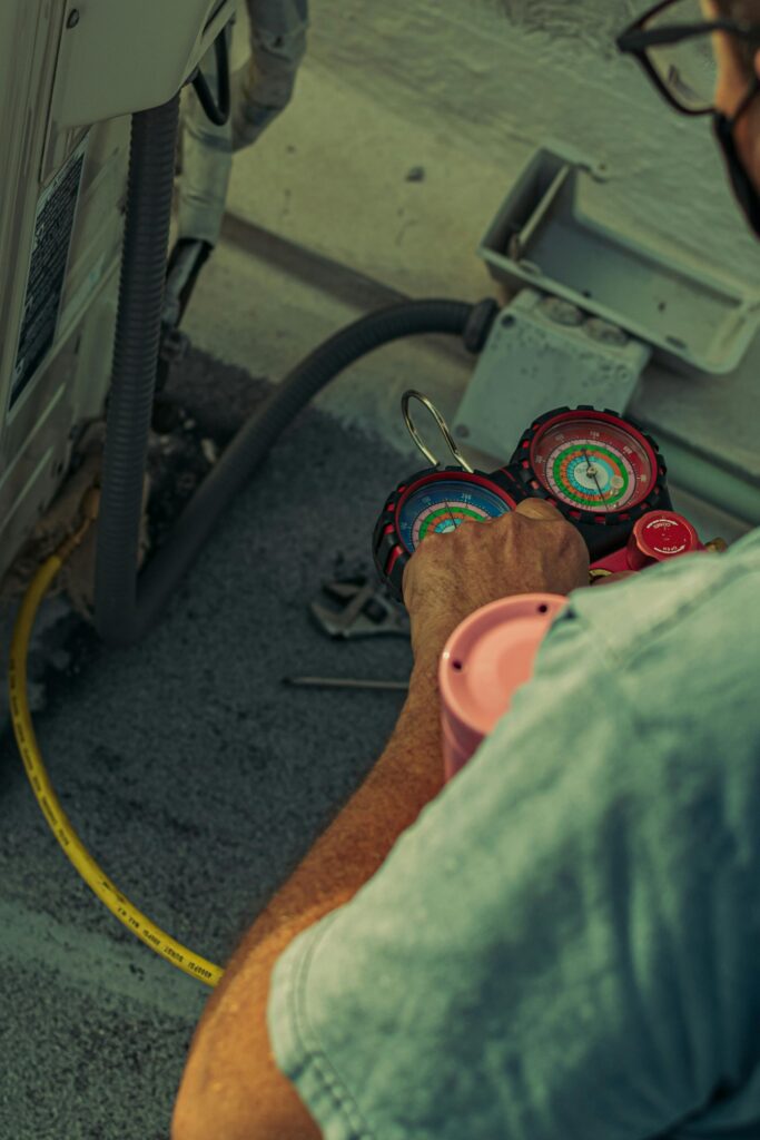 Experienced Seattle AC installation expert Nazar providing friendly, professional HVAC service to a local homeowner