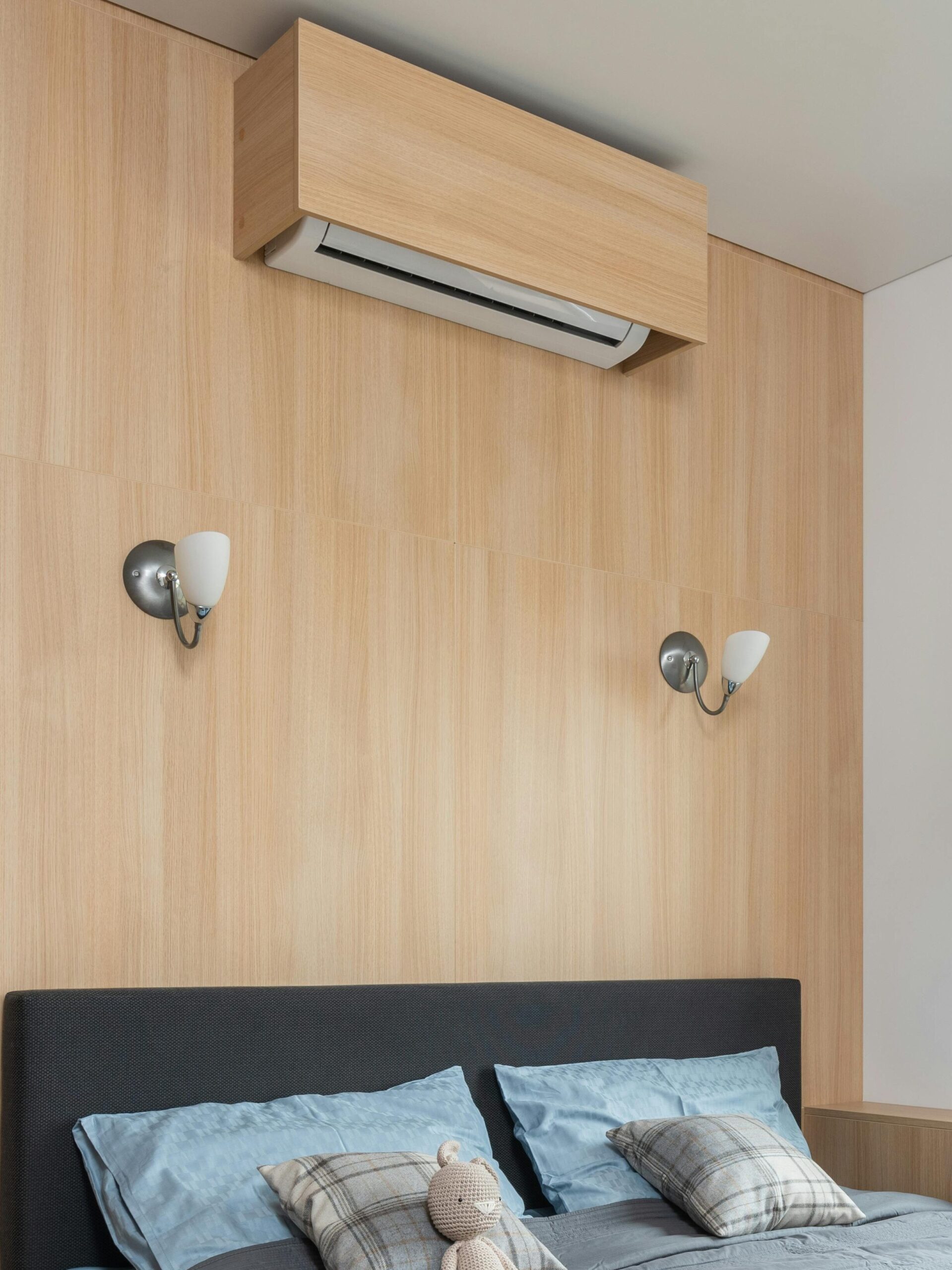 Modern Seattle bedroom with a view, showing the ideal environment for a quiet ductless mini split installation.