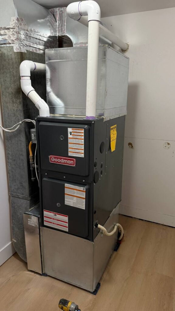 High efficiency 96% gas furnace repair process in Seattle, WA. Goodman Dark gray.