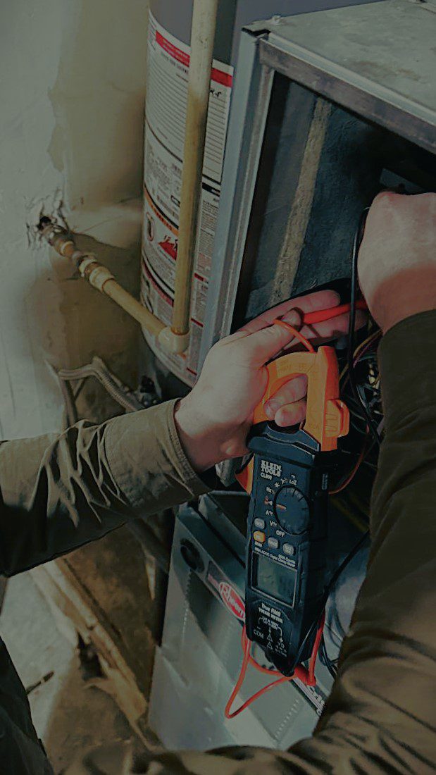 Friendly A/C Dr. Naz technician explaining furnace diagnostic results and upfront repair options to a homeowner in Snohomish County.