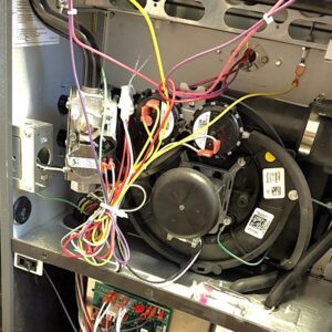 High efficiency 96% gas furnace repair process. Heating services included wires replacement