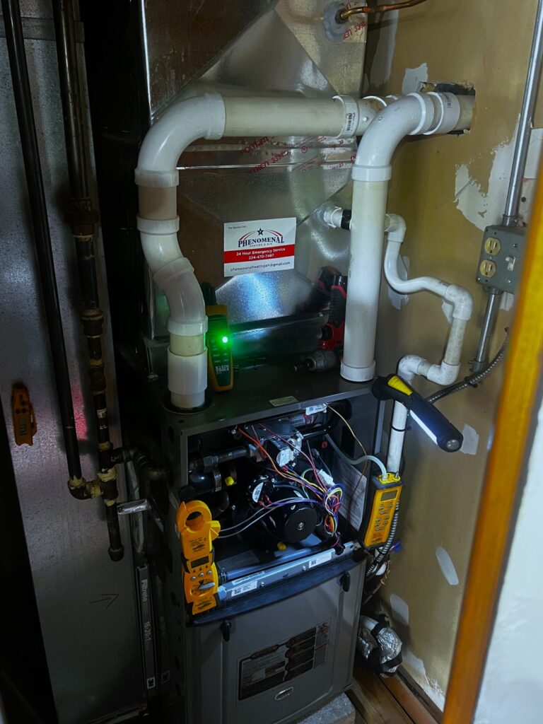 A/C Dr. Naz expert using a multimeter to test furnace blower motor electrical components.