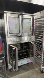 Disassembled electric commercial steamer for buzzer replacement.