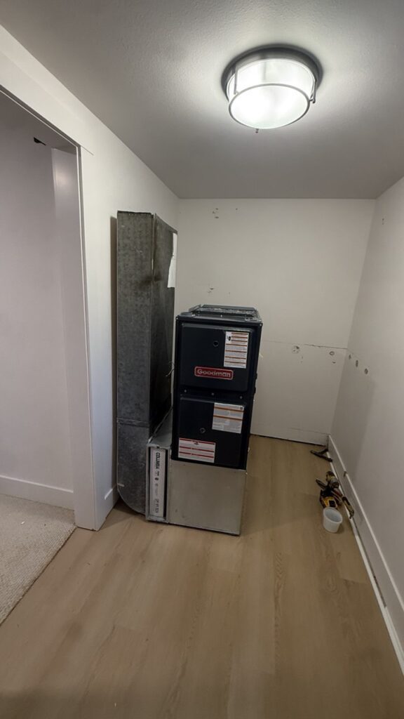 Inspecting residential ductwork for leaks to improve furnace airflow and energy efficiency in Edmonds.