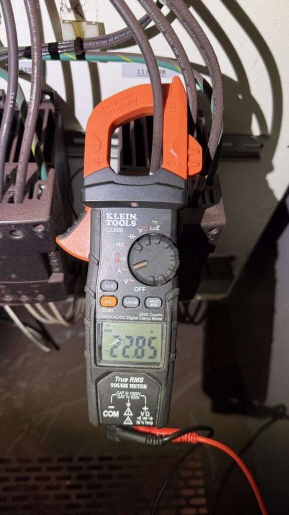 A/C Dr. Naz providing high-volume bakery equipment service for a double-stack convection oven in a busy Snohomish County pastry shop.