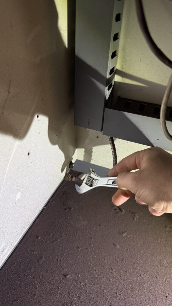 A/C Dr. Naz technician replacing a faulty blower motor in a Vulcan commercial convection oven in a Seattle restaurant.