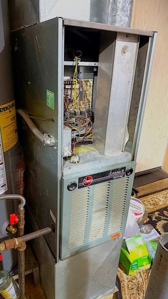 Furnace blower motor inspection by professional technician in Seattle area