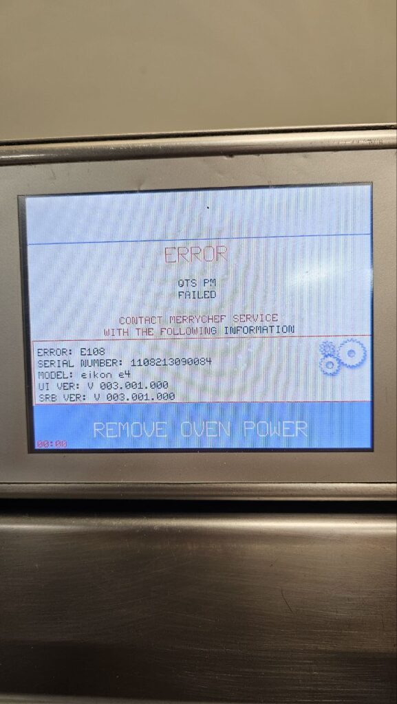 Faulty Alto-Shaam high-speed oven sitting on a commercial kitchen line before same-day repair service.