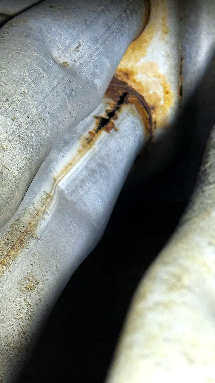 RTU has a crack in a heat exchanger. Repair process in one of the Seattle businesses