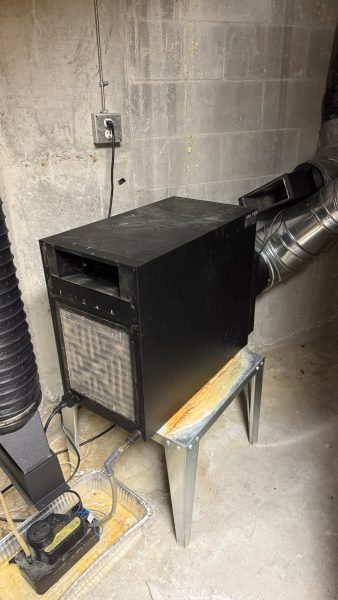 Wine cooler repair in seattle, wa and whole puget sound area, during the process of HVACR certified technician removing old, broken cooling unit