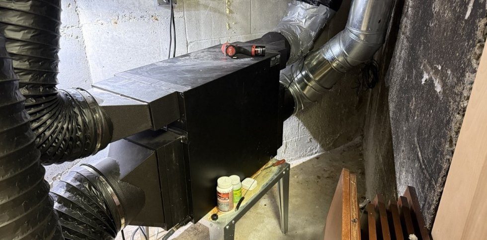 Wine cooler repair in seattle, wa and whole puget sound area, during the process of HVACR certified technician work, black cooling unit and pipes