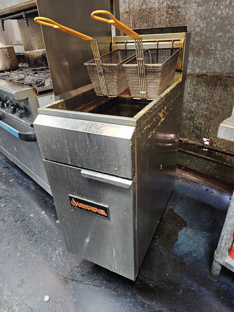 Process of commercial fryer repair on a restaurant line — Seattle, WA