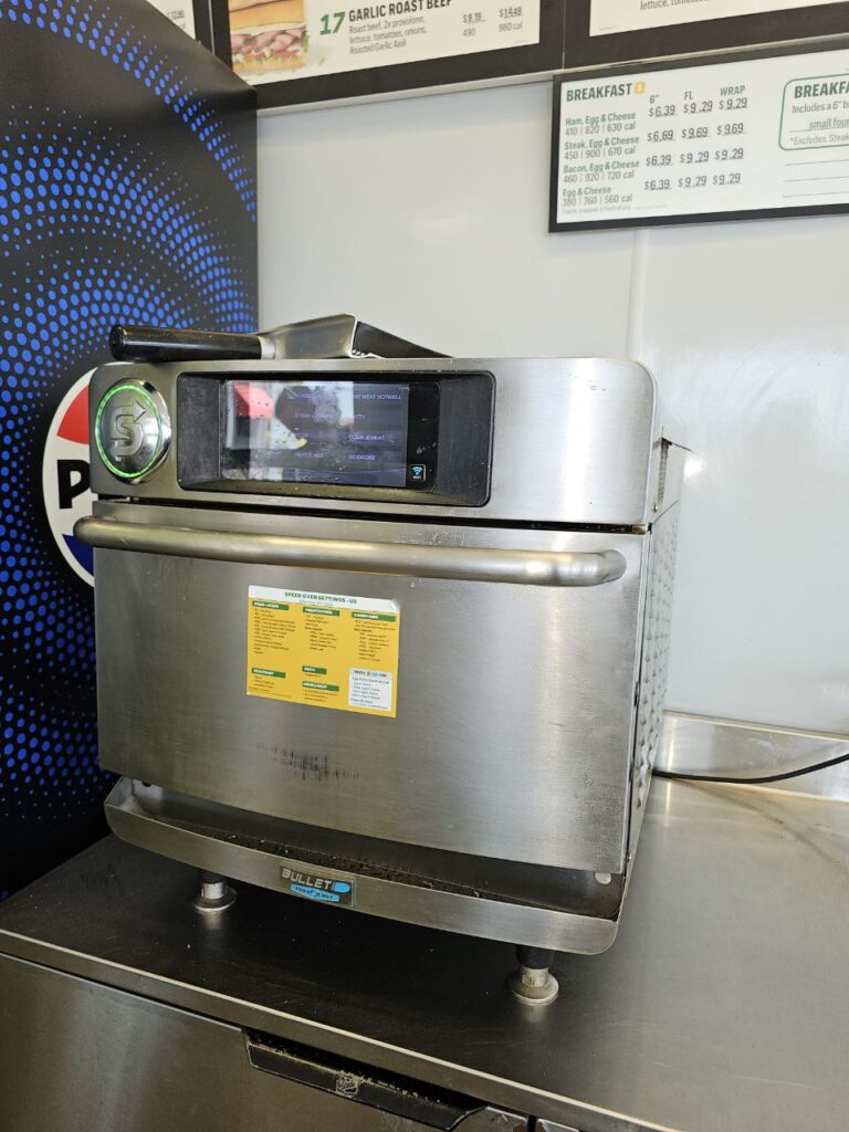 Stainless steel Rational turbo oven in a Seattle hotel kitchen awaiting professional heating element repair.
