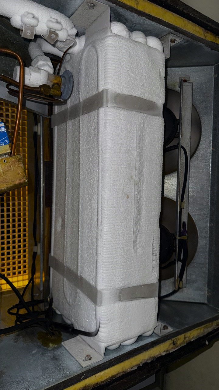 Severe evaporator coil icing on a commercial walk-in cooler at an Everett facility requiring precision diagnostics and repair.