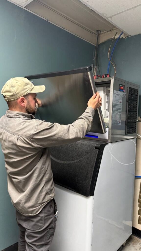 A/C Dr. Naz technician at commercial ice maker — Marysville WA gas station