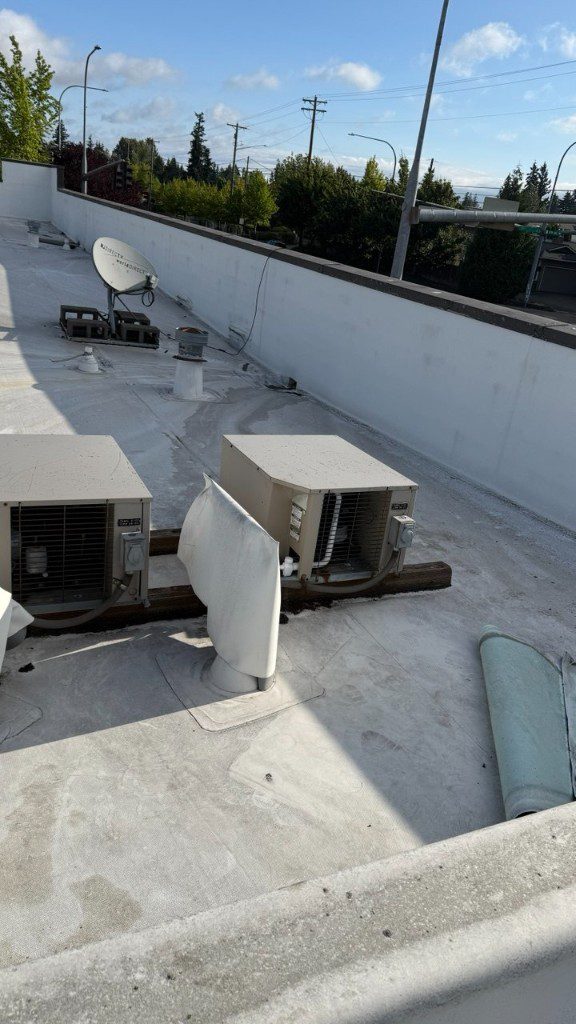 Overhead view of rooftop commercial refrigeration condensing units