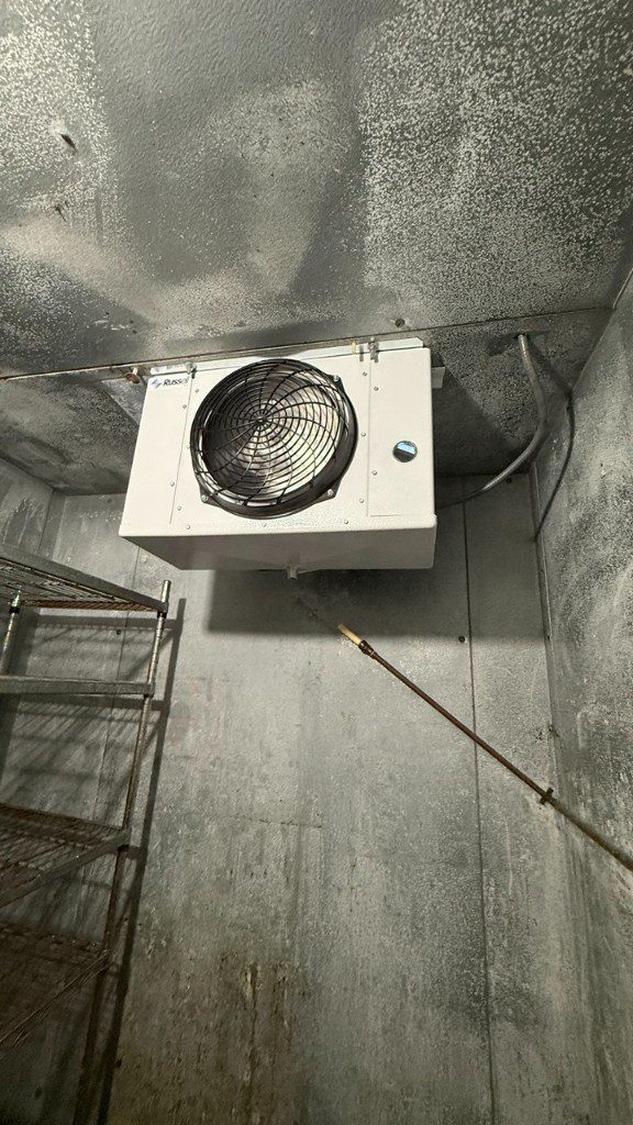 Russell walk-in cooler evaporator unit interior during service