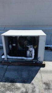 Walk-in cooler condensing unit on roof