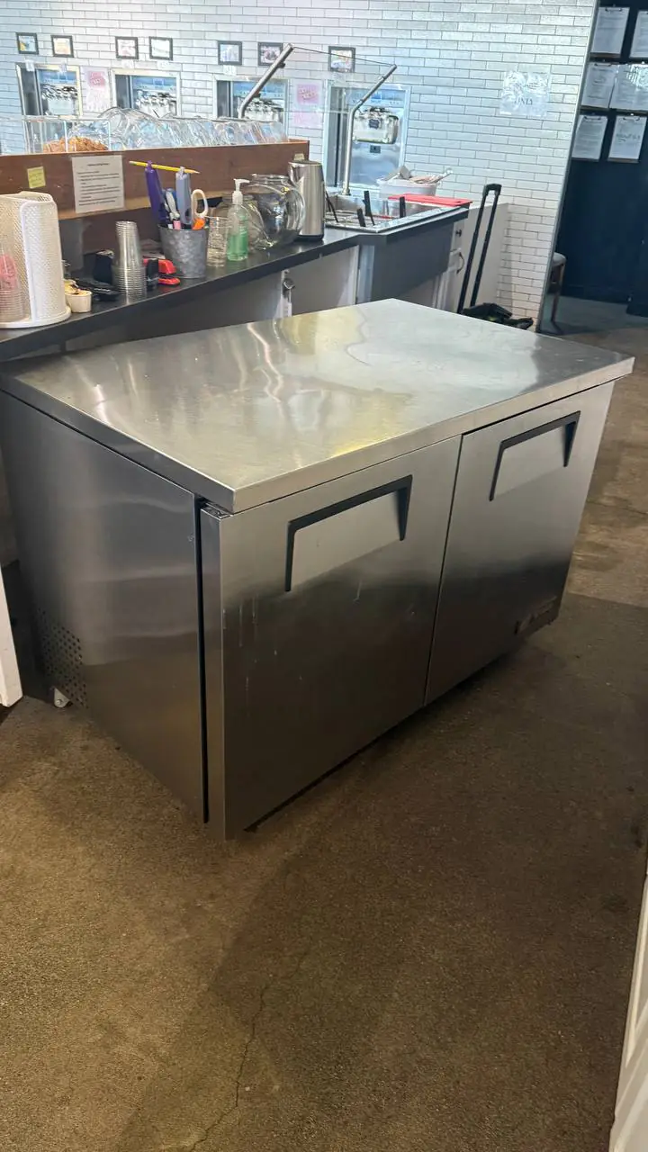 Reach-in refrigerator repair on a cook line